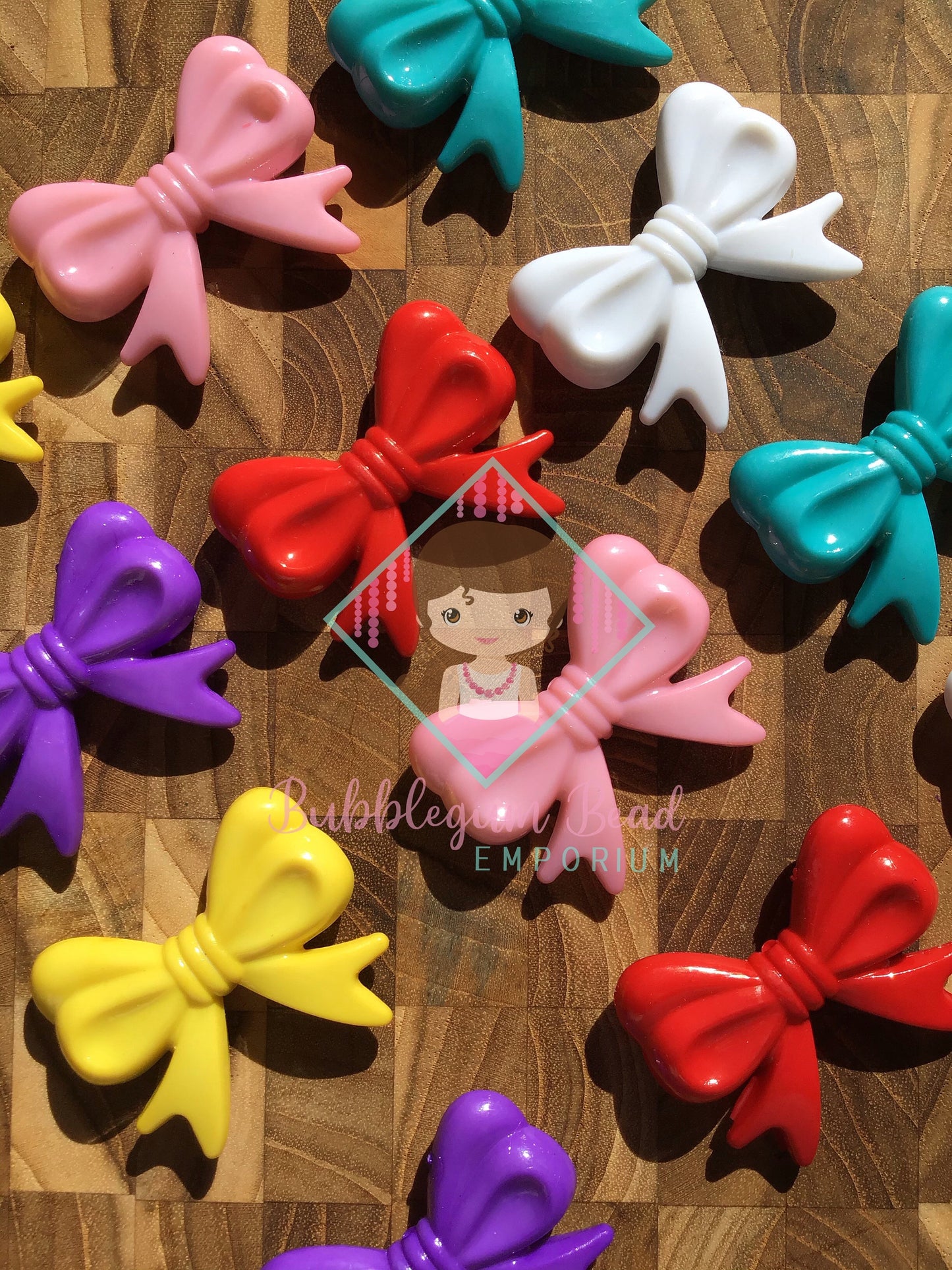 Brightly Coloured Bow Feature Beads