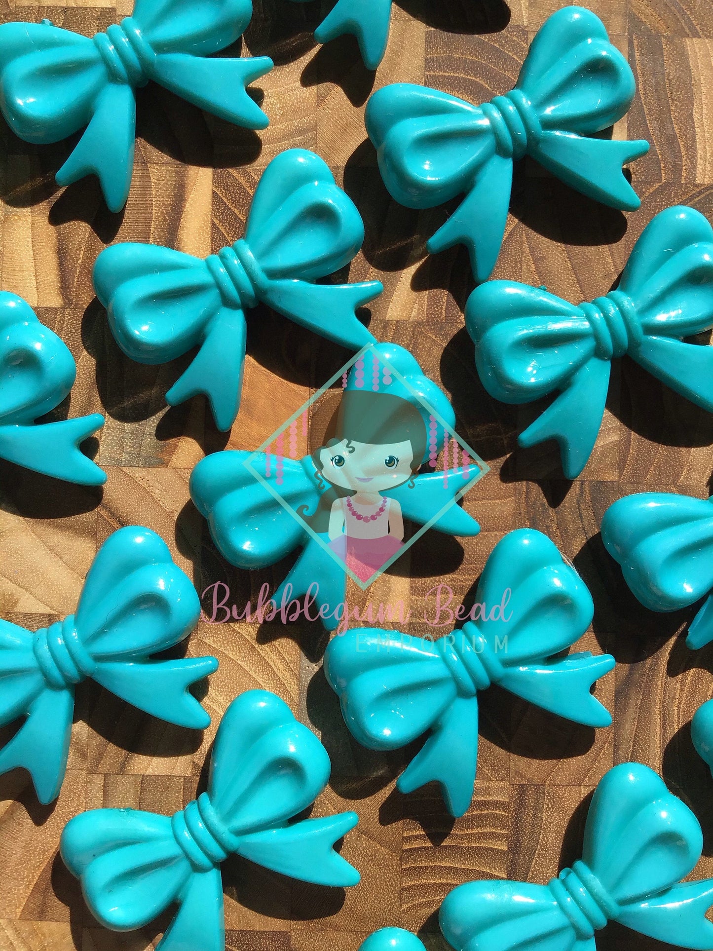 Brightly Coloured Bow Feature Beads