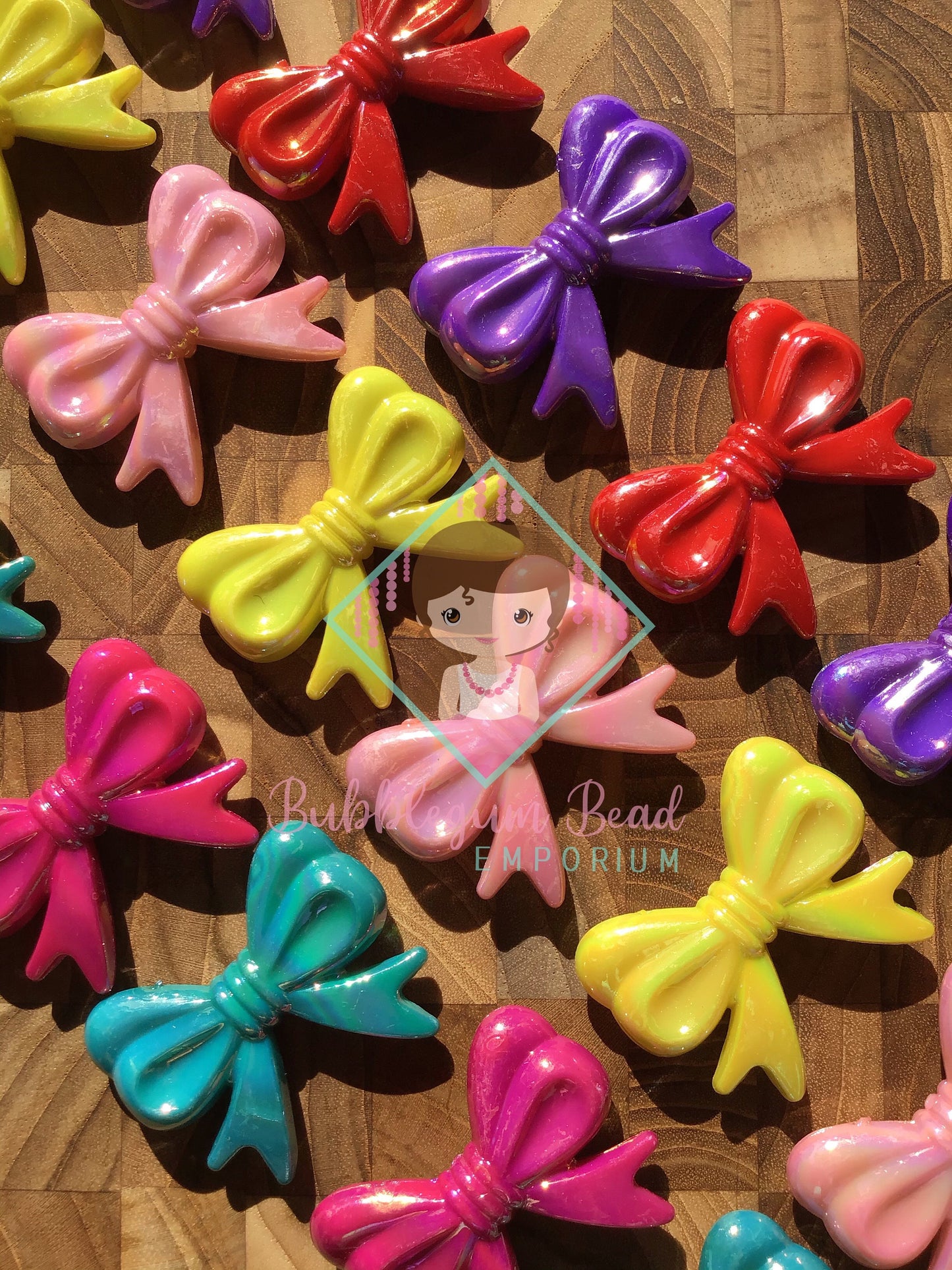 Iridescent Brightly Coloured Bow Feature Beads.